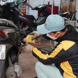 thay dầu láp xe tay ga